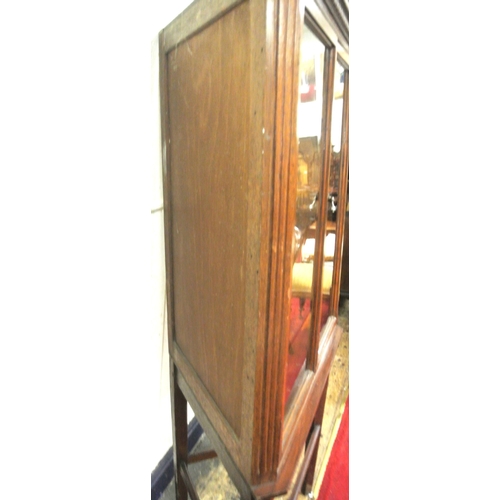 120 - Edwardian mahogany corner display cabinet with reeded frieze, glazed doors with shelved interior, on... 
