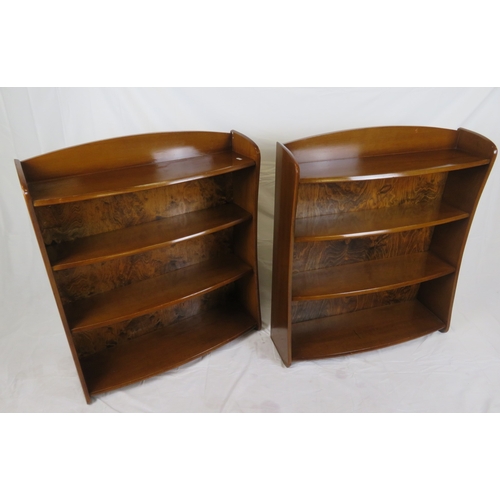 181 - Pair of Edwardian design bowfronted 4-tier open bookshelves with shaped sides, stamped 'Remploy'