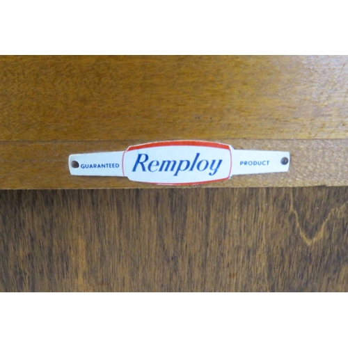 181 - Pair of Edwardian design bowfronted 4-tier open bookshelves with shaped sides, stamped 'Remploy'