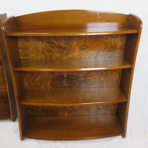181 - Pair of Edwardian design bowfronted 4-tier open bookshelves with shaped sides, stamped 'Remploy'
