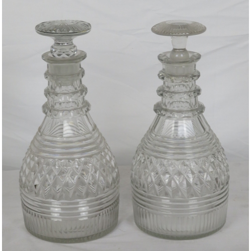 184 - Pair of Irish cut glass 3-ring decanters with panelled and diamond decoration and stoppers