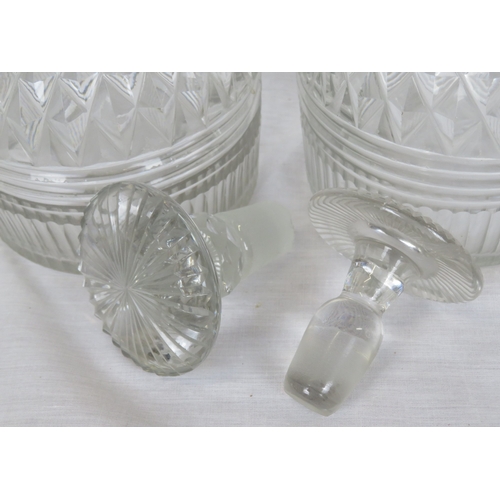 184 - Pair of Irish cut glass 3-ring decanters with panelled and diamond decoration and stoppers