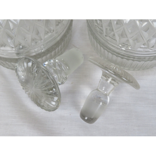184 - Pair of Irish cut glass 3-ring decanters with panelled and diamond decoration and stoppers