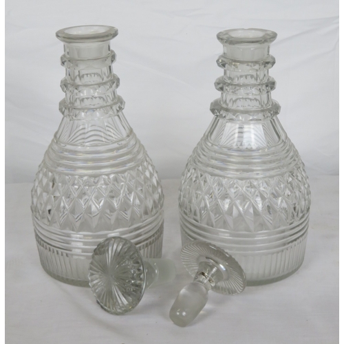 184 - Pair of Irish cut glass 3-ring decanters with panelled and diamond decoration and stoppers
