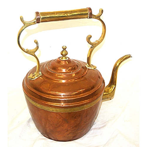 193 - Oriental copper and brass kettle with shaped handles and spout