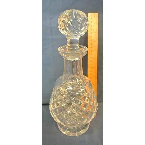 197 - Waterford Crystal cut glass baluster shaped decanter with faceted neck and round raised base