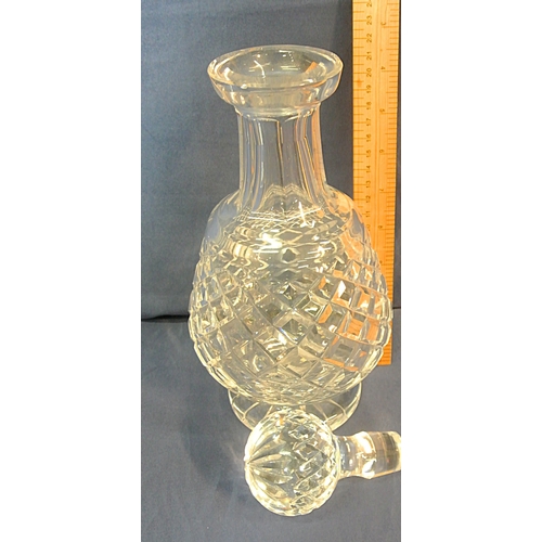 197 - Waterford Crystal cut glass baluster shaped decanter with faceted neck and round raised base