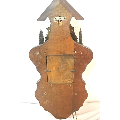 207 - Dutch style mahogany clock with revolving Atlas figure and round dial