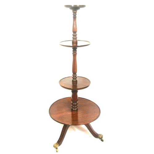215 - Edwardian mahogany 4 tier round dumbwaiter with raised rims, baluster columns, on hipped tripod with... 