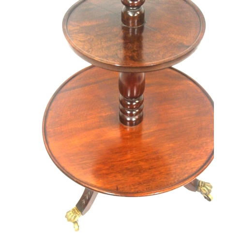 215 - Edwardian mahogany 4 tier round dumbwaiter with raised rims, baluster columns, on hipped tripod with... 