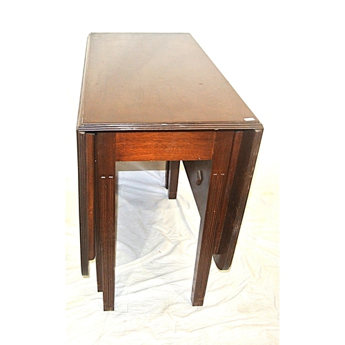 235 - Edwardian mahogany dining table with drop leaves, rounded corners, reeded borders, gateleg support, ... 