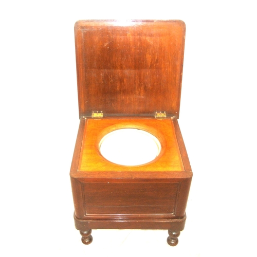 87 - Edwardian mahogany commode with lid, on turned legs