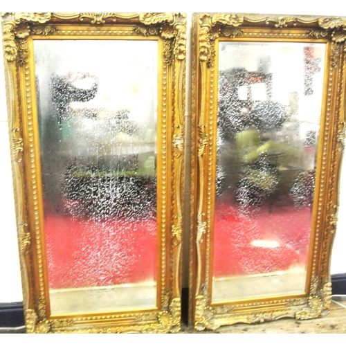 90 - Pair of Regency style gilt framed bevelled glass mirrors with ornate foliate, scroll and beaded deco... 