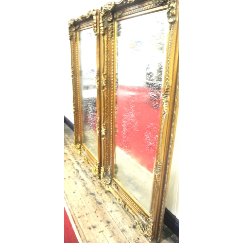 90 - Pair of Regency style gilt framed bevelled glass mirrors with ornate foliate, scroll and beaded deco... 