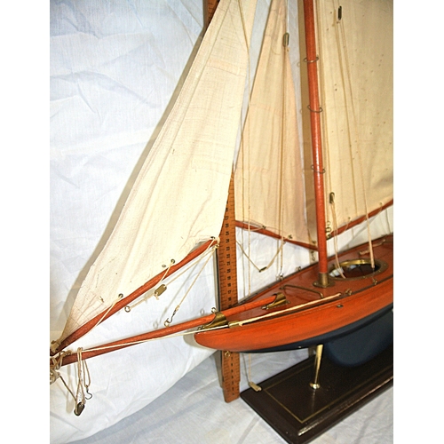 93 - Hand crafted timber model of gaff rigged yacht on stand