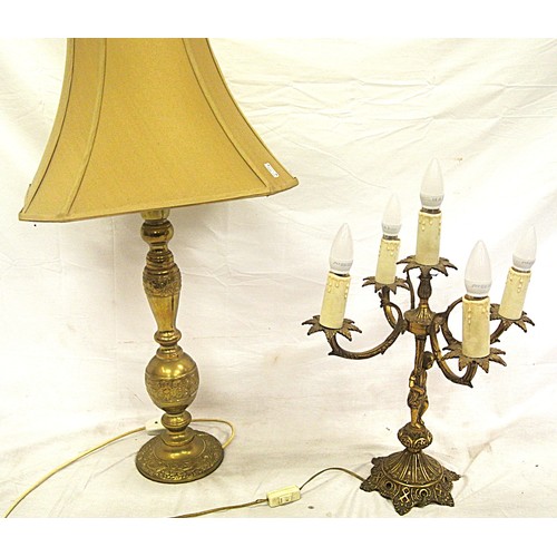 238 - 2 ornate brass electric lamps with foliate decoration