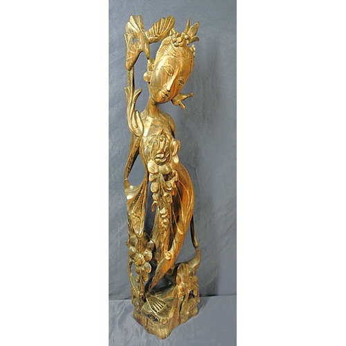 308 - Oriental rosewood carved figure of a lady with ornate foliate decoration