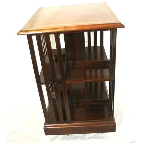 325 - Edwardian design inlaid mahogany revolving bookcase with railed sides & shaped base
