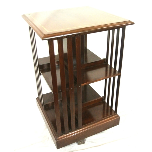 325 - Edwardian design inlaid mahogany revolving bookcase with railed sides & shaped base