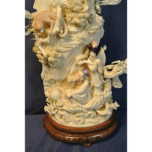 329 - Ornate intricately designed Oriental Geisha with figures & monkey depicting one of the eight immorta... 