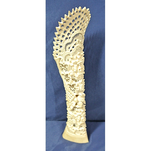 330 - Oriental carved Bali totem with figure of a deity and serpent