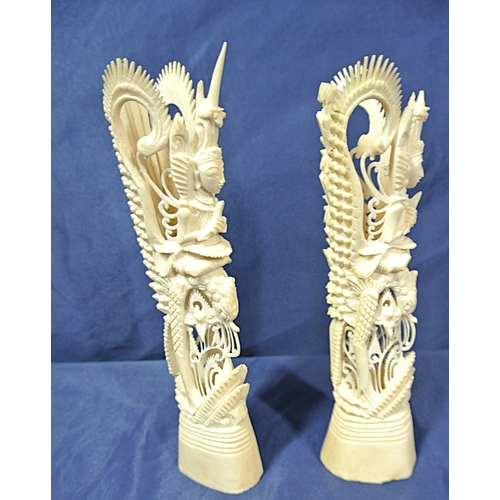 331 - Pair of Balinese totem poles intricately decorated with Balinese deities