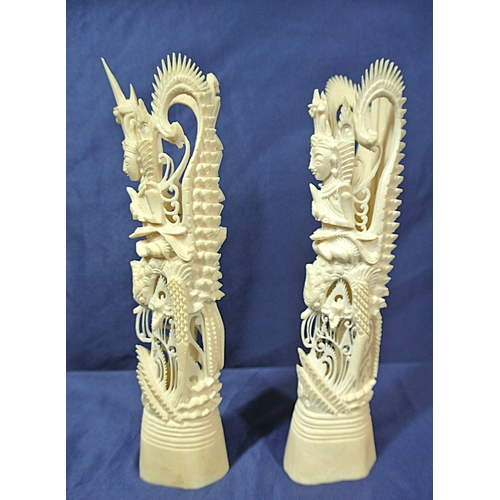 331 - Pair of Balinese totem poles intricately decorated with Balinese deities