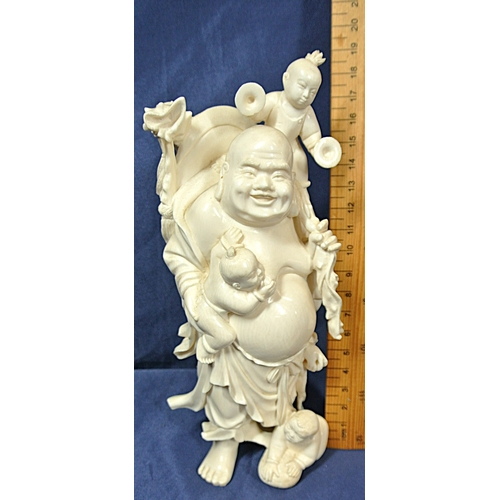 333 - Oriental figure of the Laughing Buddha with children