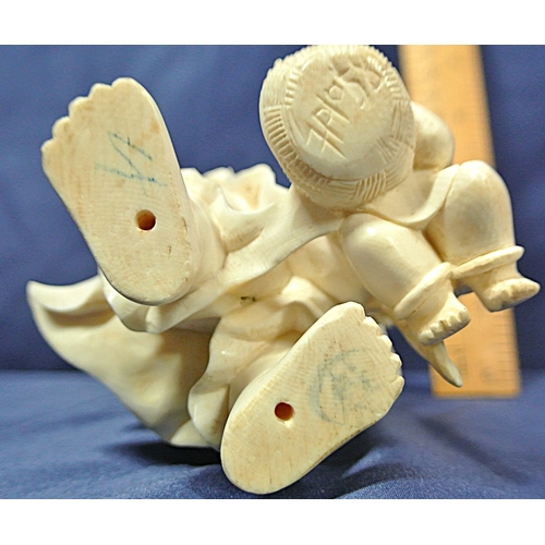 333 - Oriental figure of the Laughing Buddha with children
