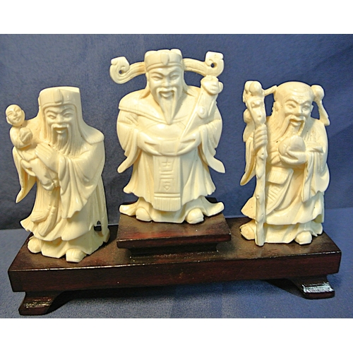 334 - Vintage Chinese figurines depicting Sanxing, 3 star gods, on timber base