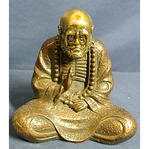 338 - Oriental brass and copper figure of Buddha Bodhidharma seated
