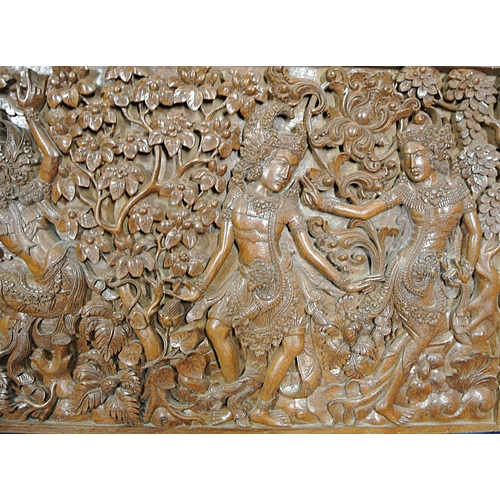 352 - Ornate Oriental carved teak panel with foliate figures & animal decoration