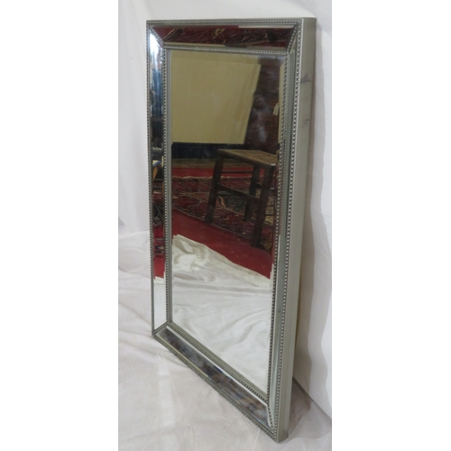 446 - Art deco style bevelled glass wall mirror with beaded decoration