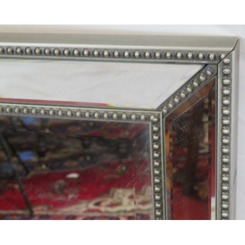 446 - Art deco style bevelled glass wall mirror with beaded decoration