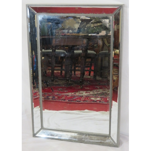 446 - Art deco style bevelled glass wall mirror with beaded decoration
