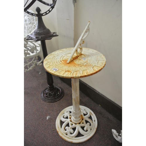 469 - Cast iron sundial with pierced gnomon, on round base