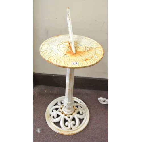 469 - Cast iron sundial with pierced gnomon, on round base