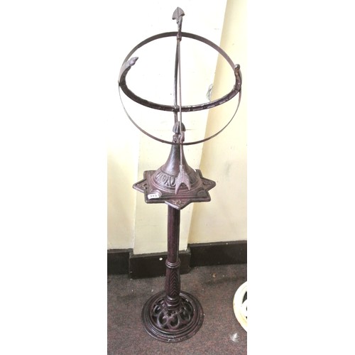 473 - Ornate cast iron armillary sphere sundial on hexagonal column with round base