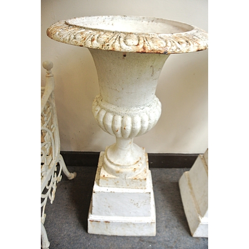 475 - Pair of Victorian design cast iron campana shaped garden vases with egg and dart rims, ribbed socles... 