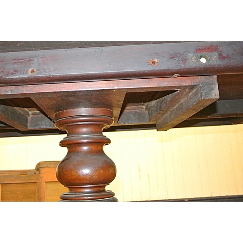 480 - Victorian mahogany square dining or library table with tip-up top, turned column, on hipped quadrapo... 