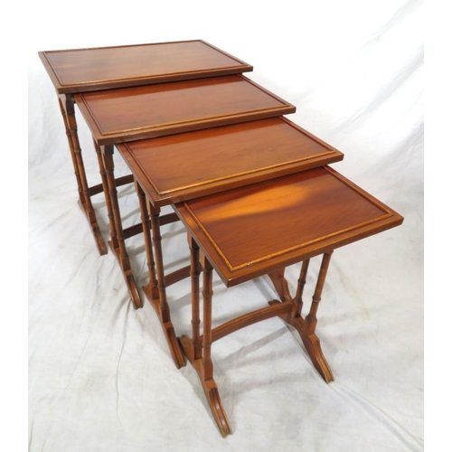 481 - Edwardian yew quartetto nest of 4 graduating tables with raised rims, turned columns, on bracket fee... 