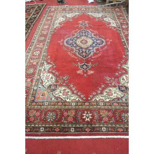 482 - Rich red ground vintage Persian Tabriz carpet with central medallion design 320 x 200 cm