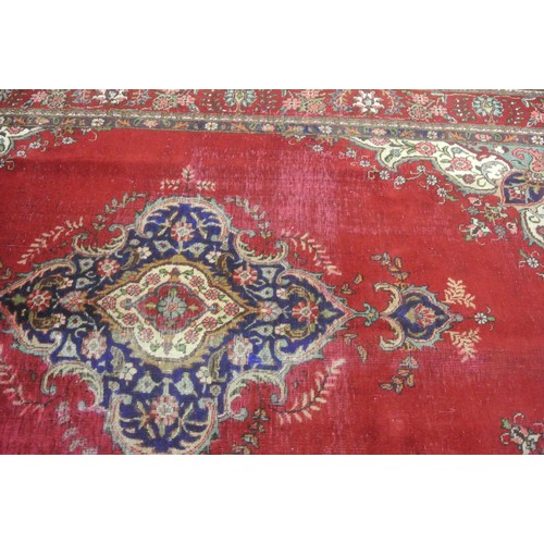482 - Rich red ground vintage Persian Tabriz carpet with central medallion design 320 x 200 cm