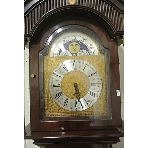 483 - Domed topped inlaid mahogany longcase clock with foliate decorated dial, moving moon dial, brass pen... 