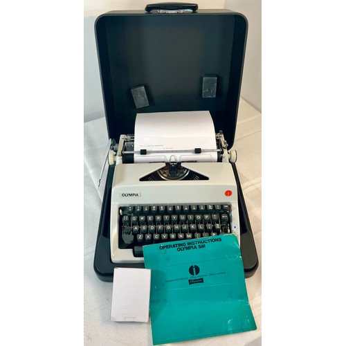 39 - Recently Serviced Cased Olympia SM Typewriter With Spare Ribbon