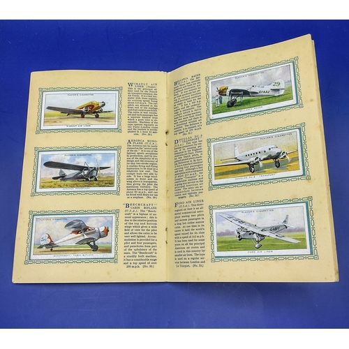 32 - Collection of 8 1930s-1940s Cigarette Card Albums by John Player & Sons and W.D. & H.O. Wills, Featu... 