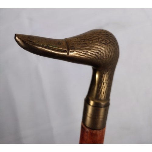 127 - 2x Walking Stick / Canes - Brass Duck Head Topped & Carved (possibly Sandalwood) and a Silver Metal ... 