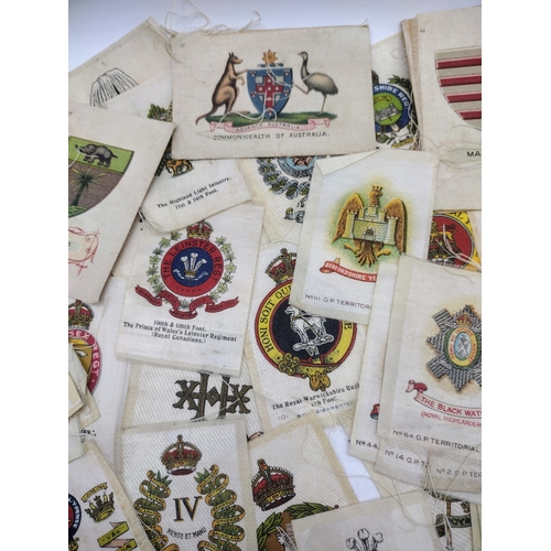 172 - B.D.V. and Wills Cigarette Silks Featuring Military and Regimental Badges, Including British and Col... 