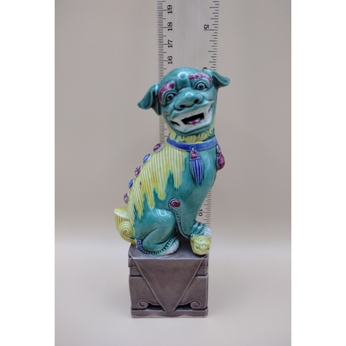 25 - Pair Of Mid-20th Century Chinese Sancai Glazed Biscuit Foo Dogs, Marked '189' On Bases, Featuring Tr... 