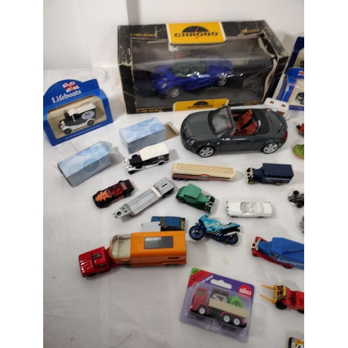 32 - Collection of Die-Cast Vehicles Featuring 1:18 Scale Models by Chrono and Maisto, Including 1997 Lot... 